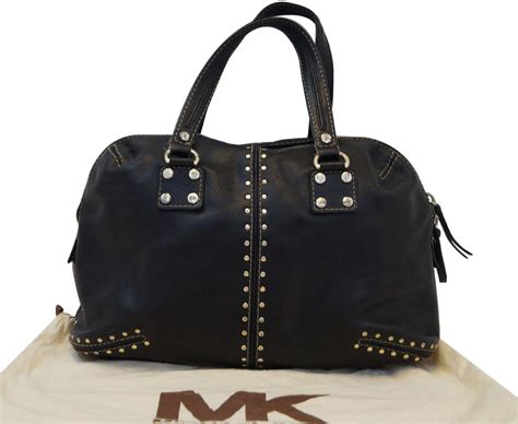 black michael kors bag with gold studs|Michael Kors uptown astor bag.